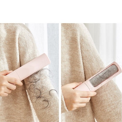 PawGloss lint roller brush picking up cat hair from a blanket