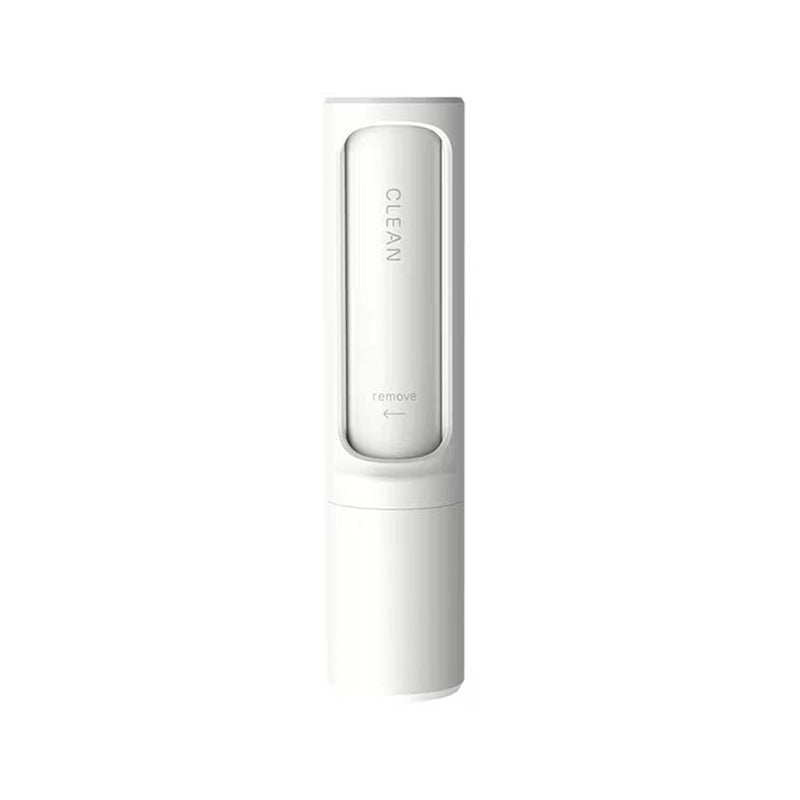 Compact pet hair remover brush ideal for travel, car seats, and on-the-go use