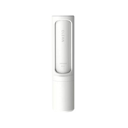 Compact pet hair remover brush ideal for travel, car seats, and on-the-go use