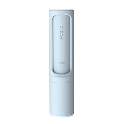 Close-up detail of the PawGloss pet hair remover brush and internal hair collection compartment