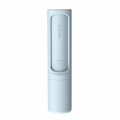 Pet hair remover brush opened to show the internal hair collection compartment