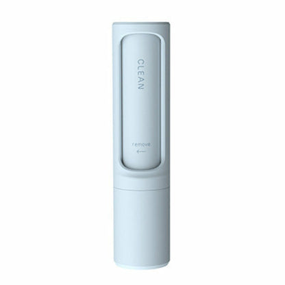 Pet hair remover brush opened to show the internal hair collection compartment
